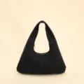 Vintage black suede crescent hobo bag featuring stylish patchwork stitching details - Black