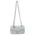 Light blue quilted chain strap shoulder bag with turn-lock and floral charm detail. - Blue