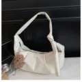 Solid color white shoulder bag hobo dumpling bag for women, stylish casual minimalist design. - With Charm / White