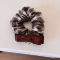 Detailed macro view of a vintage plaid hair scrunchie featuring a brown fabric bow - Hair Tie / Green Plaid Bow (4#)