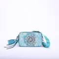 Elegant cyan blue camera bag featuring a central mandala print and wide strap detail - Mandala Print Style / Light Blue