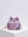 Elegant lavender bucket bag featuring floral sequin embroidery and a pearl chain strap - Random Flower Pattern Distribution / Lavender