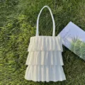 Elegante weiße Tragetasche mit Faltenstufen und frischem minimalistischem Design - 3-Lagig Weiß Plissee