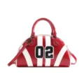 Stylish red and white bowling handbag with number 02 patch and glossy oily leather finish. - 02 Patch Style / Burgundy