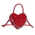 Red heart-shaped women handbag crossbody bag with card suits embossing and silver chain charms. - Embossed Playing Cards Heart Bag