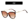 Schildpatt Cat-Eye Sonnenbrille mit Perlenherz-Detail an eleganten goldenen Metallbügeln - Verlauf Teebraun Gläser (C2) / Schildpatt (C2)