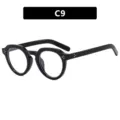Gafas de sol retro negras con montura redonda irregular y detalles de remaches modelo C9 - Negro Brillante Lente Transparente