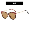 Stylische Katzenaugen-Sonnenbrille mit Perlenherz-Details in Schildpatt und Rot C4 - Teebraun Gläser (C4) / Rot (C4)