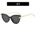 Lunettes de soleil œil de chat pour femmes avec monture noire et branches dorées - Style C1 / Noir Brillant / Gris
