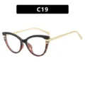 Élégantes lunettes de soleil œil-de-chat avec monture écaille et noire et branches dorées - Noir Écaille Séparé Lentille Claire