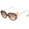 Lunettes de soleil ovales oversize avec monture écaille et branches dorées courbées - Monture Mouchetée Lentille Thé Dégradé (C6)