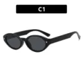 Gafas de sol ovaladas negras vintage con detalles elegantes de remaches de estrella, color C1 - Negro Brillante Lente Gris