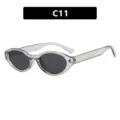 Trendy retro oval sunglasses featuring transparent grey frames and metal stud accents - C11-Light Grey Frame Grey Lenses