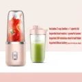 Tragbarer wiederaufladbarer Mini-Mixer mit rosa Basis und zwei Saftbechern - 6 Klingen / Doppelbecher / Rosa