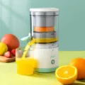 Portable USB rechargeable electric orange juicer with transparent separation chamber - 3.7V White Green