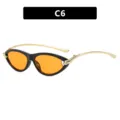 Moderne cat-eye zonnebril met levendige oranje glazen en elegante gouden metalen pootjes - Glanzend Zwart Oranje Lenzen (C6)