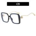 Moderne quadratische Sonnenbrille mit perlenbesetzten gewellten Bügeln in Schwarz C9 - C9-Schwarzer Rahmen Klare Linse