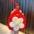 Handmade red crocheted mini coin purse with white daisy flower charm - Red
