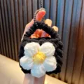 Handmade black knitted mini coin purse keychain with large white and yellow flower charm - Black