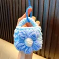 Cute light blue knitted flower coin purse keychain and mini wool storage bag - Blue