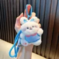 Cute white plush bunny keychain with a blue bow and a knitted outfit ornament - White Rabbit