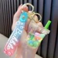 Cute bubble tea cup liquid quicksand keychain with colorful beans and wrist strap - Green