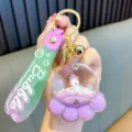 Purple acrylic unicorn bear paw floating liquid quicksand keychain for bags and cars - Purple