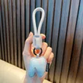 Leather keychain featuring a light blue padded letter N with a braided cord - Letter N