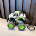 Exquisite white monster truck keychain with green tires for kids schoolbag pendant - White