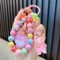 Kleurrijke iriserende kralen konijn sleutelhanger armband met hartbedeltje en letters - Roze
