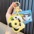 Yellow cartoon panda projection camera keychain shown as a handheld toy accessory - Panda Camera / Yellow