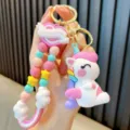 Porte-clés licorne mignon aux couleurs macaron avec perles colorées pour sacs de filles - Blanc
