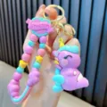 Porte-clés licorne violette macaron mignon avec dragonne en perles pour sacs et clés de voiture - Violet