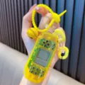 Vibrant yellow retro handheld game console keychain featuring a playable mini Tetris game - Transparent Yellow