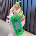 Mini transparent green Tetris game machine keychain with silicone lanyard and bell - Transparent Green