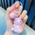 Pink iridescent electroplated acrylic unicorn keychain with a cute bell charm pendant - Pink