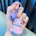 Cute electroplated acrylic unicorn keychain in iridescent purple with bell for backpack. - Purple