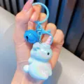 Cute electroplated acrylic unicorn keychain with blue bell accessory in gradient colors - Blue