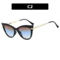 Stylish cat-eye anti-blue light glasses featuring black frame and gradient tint lenses - Glossy Black Tea Blue