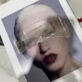 Futuristic one-piece wrap-around visor sunglasses with a clear brownish tinted lens - Clear White