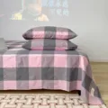 High-quality minimalist pink and grey checkered washed cotton pillowcase pair on a bed - Grey Pink Large Plaid / Single Piece