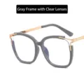 Stylish solid grey cat-eye blue light blocking glasses with gold hollow temples - Anti-Blue Light Plain Lens / Transparent Gray
