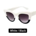 Retro cat eye sunglasses featuring a stylish white and black two-tone split frame design - White Top Black Bottom