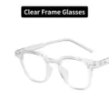 Clear transparent anti-blue light glasses with retro round frame and stud detail - Clear White