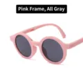 Faltbare runde Kindersonnenbrille mit rosa Rahmen und dunkelgrauen Gläsern - Rosa Rahmen Graue Linse
