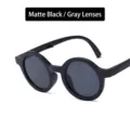 Faltbare Sonnenbrille für Kinder mit mattschwarzem Rahmen und grauen Gläsern - Mattschwarzer Rahmen Graue Linse