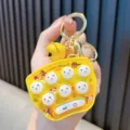 Mini yellow handheld whack-a-mole game keychain with glowing LED light stress relief toy - Yellow