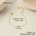 Macro detail of a gold stainless steel bracelet featuring a champagne rectangular zircon - Rectangular Champagne Zirconia Bracelet (NMSB-L344-1)