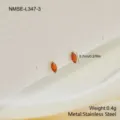 Detailed macro view showing orange marquise-cut zircon stud earrings in stainless steel - Marquise Orange Red Zirconia Earrings (NMSE-L347-3)