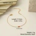 Detailed view of golden stainless steel bracelet with red zircon and size measurements. - Marquise Red Zirconia Bracelet (NMSB-L345-5)